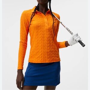 J. Lindeberg Rosemary Polo, Long Sleeve, Size Medium
Color is Exuberance Melange